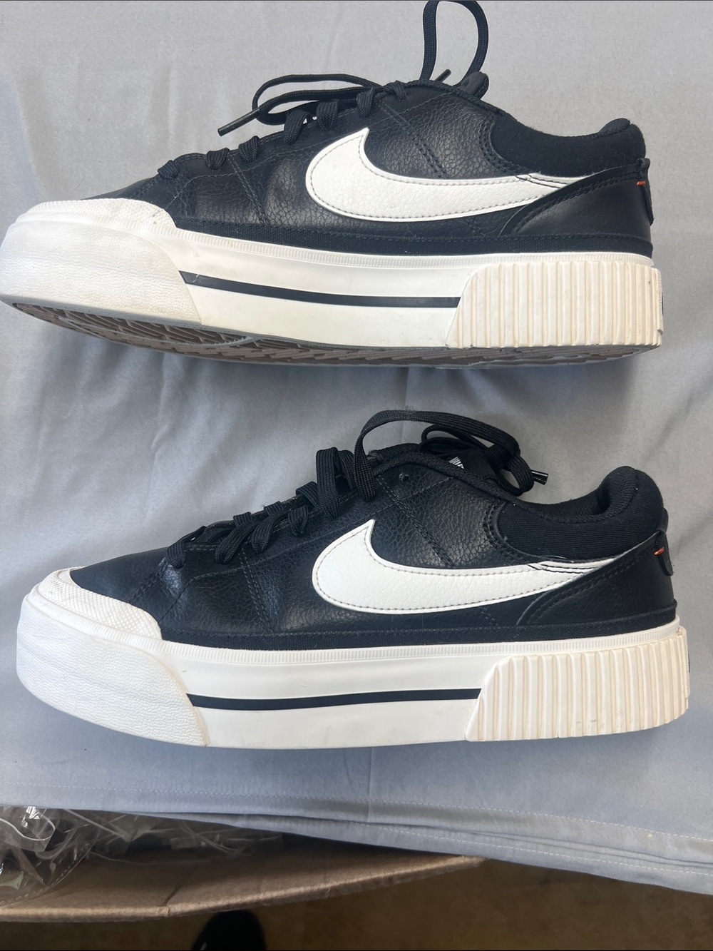 Nike Black Leather Low-Top Sneakers with White Sole and Silver Swoosh - Picture 2 of 10